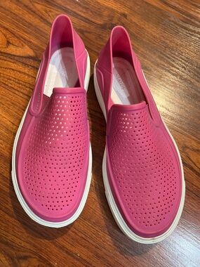 CROCS Women’s Slip-On Perforated Sneaker in Hot Pink with White Sole
